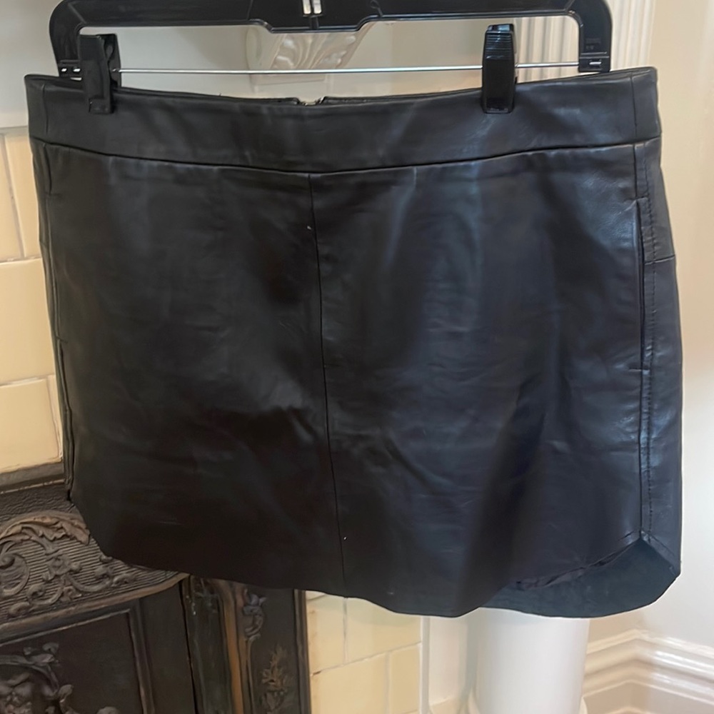 New with tag Karina Grimaldi black real leather skirt. Size medium. Fits like 6